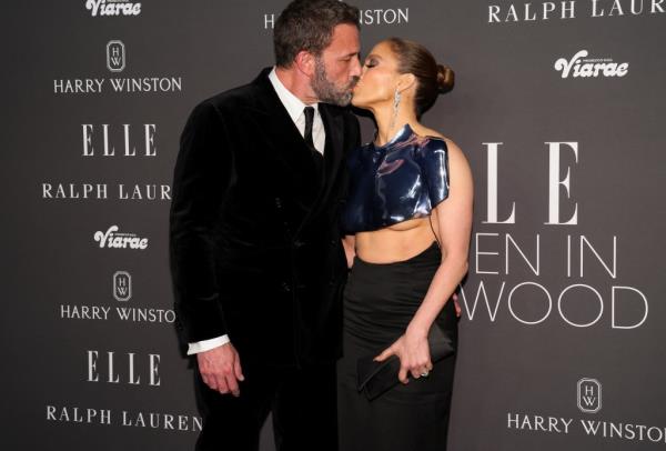 Jennifer Lopez and Ben Affleck kiss at ELLE's 2023 Women in Hollywood Celebration.