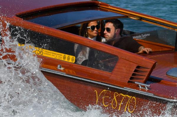 Unhappy Ben Affleck and Jennifer Aniston ona taxi boat arriving to the 78th Venice Film Festival in Venice.