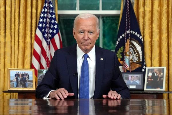 President Joe Biden pauses as he concludes his address to the nation about his decision to not seek reelection, in the Oval Office at the White House in Washington, DC, on July 24, 2024.