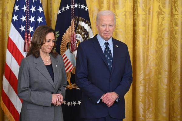 US President Joe Biden and US Vice President Kamala Harris attend an event on gun violence in the East Room of the White House in Washington, DC on September 26, 2024.
