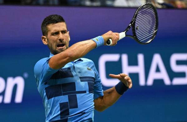Novak Djokovic hits a forehand during his second-round victory at the U.S. Open.