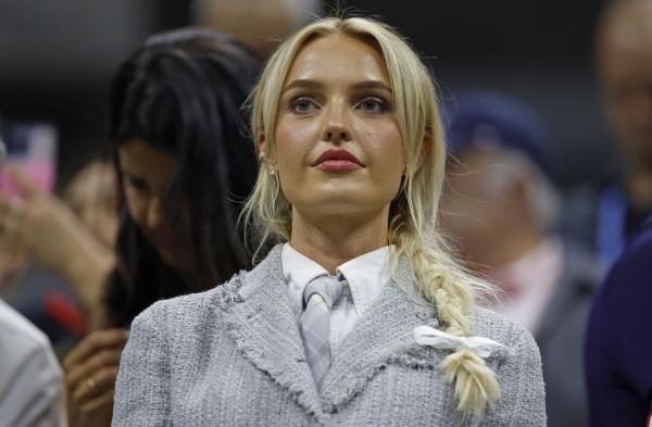 Morgan Riddle watches her boyfriend Taylor Fritz defeat Frances Tiafoe in the U.S. Open semifinal.
