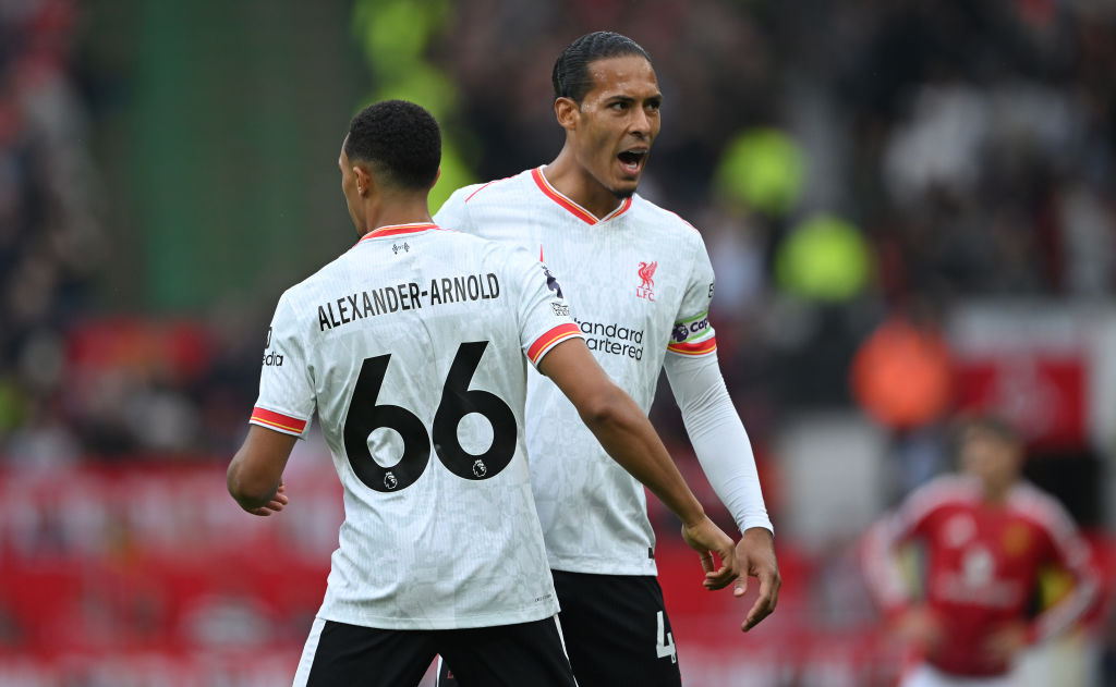 Trent Alexander-Arnold of Liverpool celebrates with teammate Virgil van Dijk, after scoring a goal