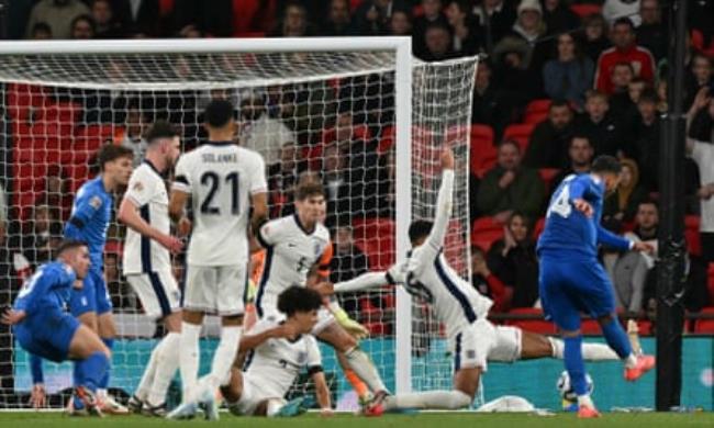 Vangelis Pavlidis scores Greece’s stoppage-time winner.