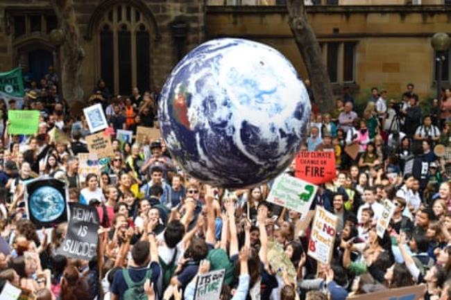 Thousands of school students from across Sydney attend the global #ClimateStrike rally at Town Hall in Sydney, 15 March 2019.