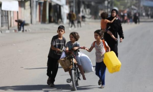 Residents fleeing Gaza on Saturday.