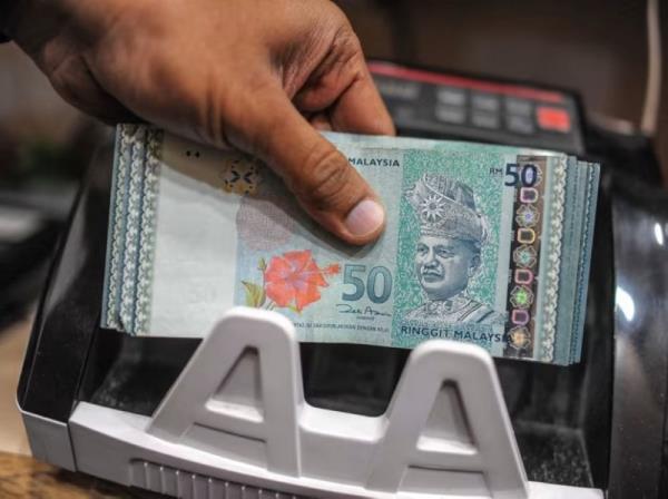 Ringgit falls versus greenback ahead of US Federal Reserve meeting