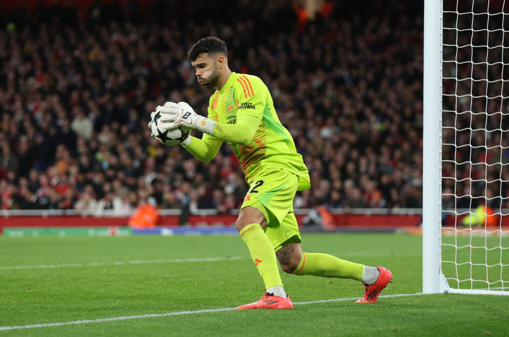 David Raya of Arsenal makes a saveduring the UEFA Champions League 2024/25 League Phase MD2 match between Arsenal FC and Paris Saint-Germain