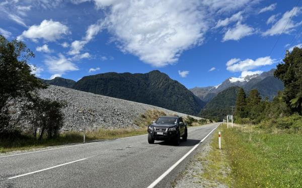 The height of the NZ Transport Agency/Waka Kotahi stopbank adjoining State Highway 6 south of Franz Josef graphically illustrates the hazard issue faced in the area.