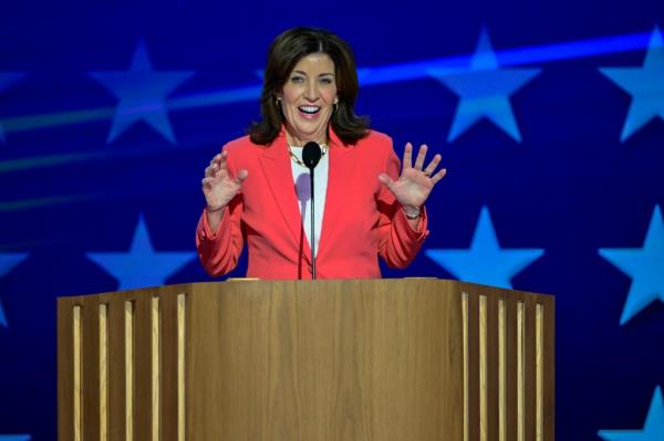Governor Kathy Hochul speaking at a podium
