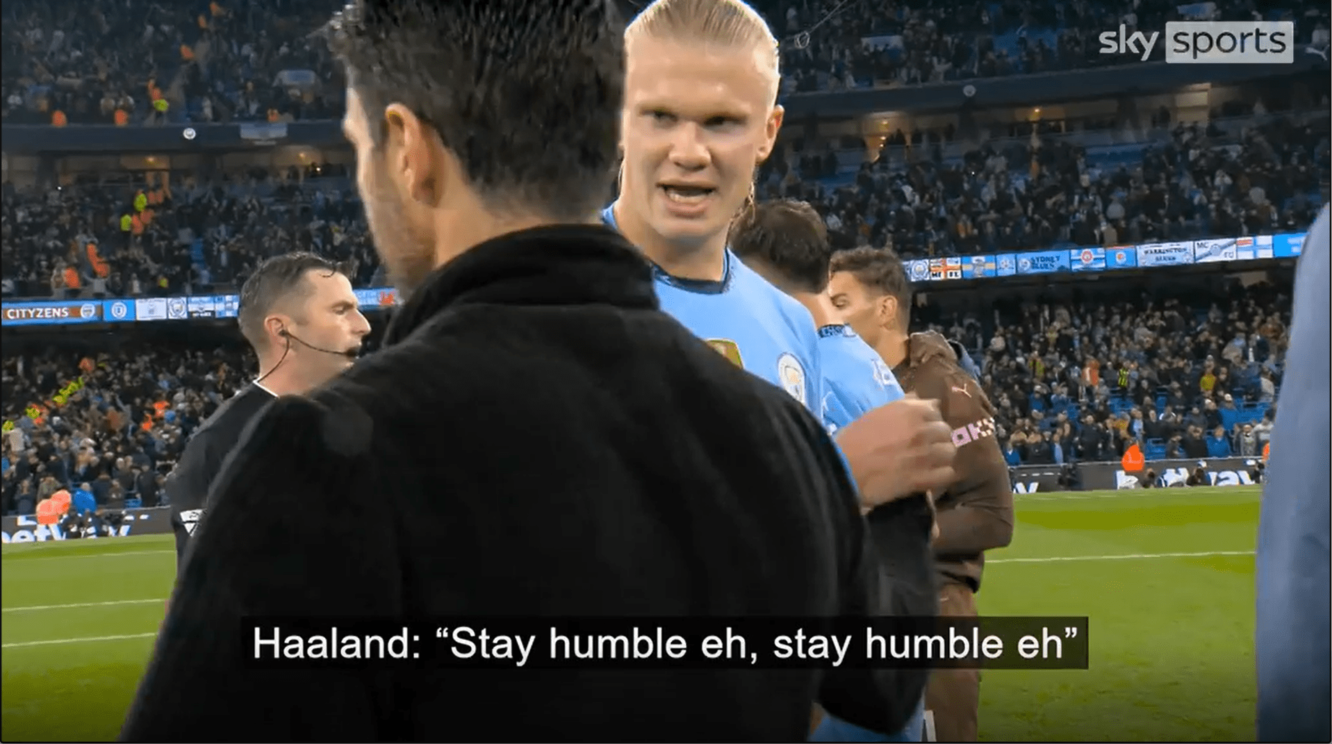 Erling Haaland and Mikel Arteta