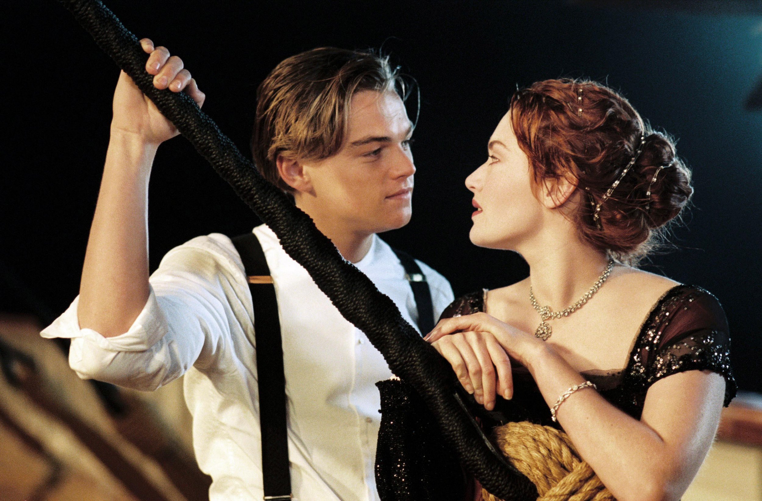 Leonardo Dicaprio (L) and Kate Winslet look into each others' eyes in a scene from the Titanic