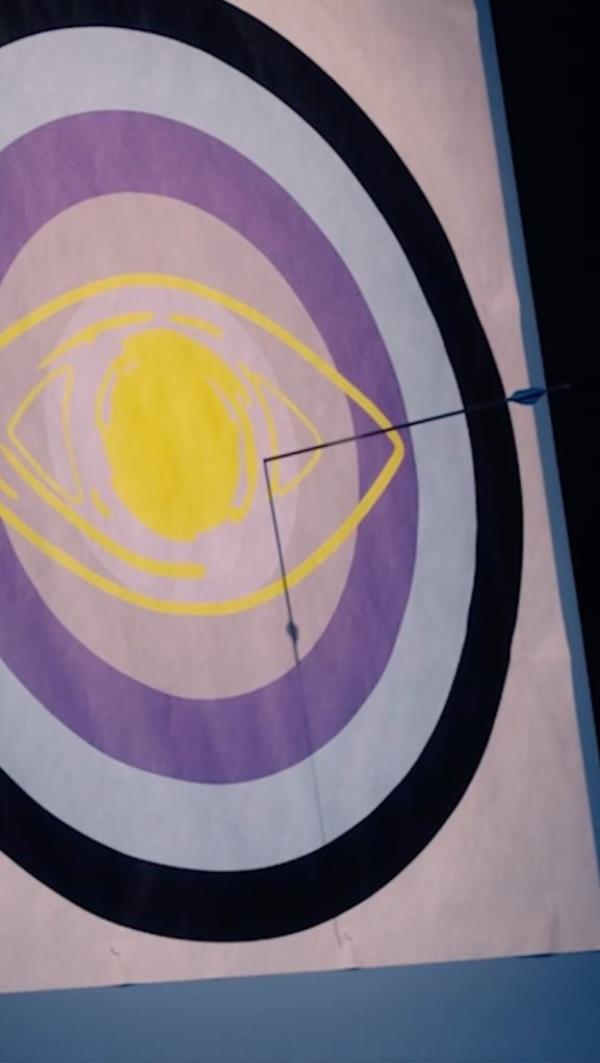 Sagg Napoli performing live archery on Dior's Paris Fashion Week runway