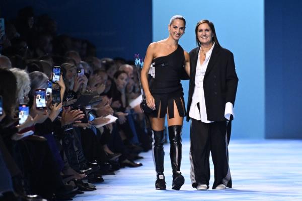 Italian fashion designer Maria Grazia Chiuri and Instagram artist Sagg Napoli acknowledging audience post Dior's Women Ready-to-wear Spring-Summer 2025 collection show