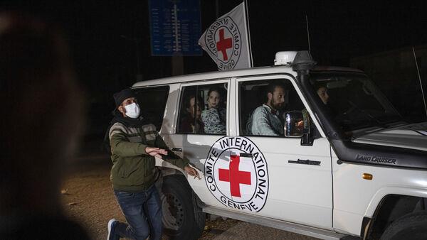 Israel and Hamas complete second day of swaps as Gaza ceasefire holds