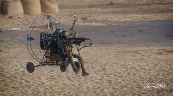 A propaganda video posted to Twitter reportedly shows Hamas terrorists using fan powered paragliders to invade Israel Oct. 7, 2023. https://x.com/XTrendHunter/status/1710884651412390295?s=20