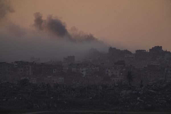 Smoke rises after an explosion in the Gaza Strip as seen from southern Israel on Tuesday (Picture: AP Photo/Leo Correa) Smoke rises after an explosion in the Gaza Strip as seen from southern Israel on Tuesday (Picture: AP Photo/Leo Correa)