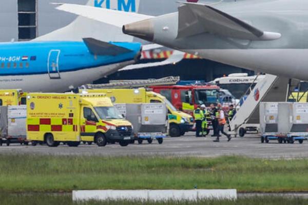 Ambulances at the scene of an emergency on board a Qatar airways flight at Dublin Airport on Sunday. Picture: Damien Storan.