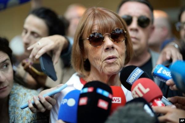 Gisele Pelicot speaks to media as she leaves the Avignon courthouse in southern France, Sept. 5, 2024. Pelicot, who was allegedly drugged by her ex-husband so she could be raped by other men while she laid unconscious, is expected to testify.