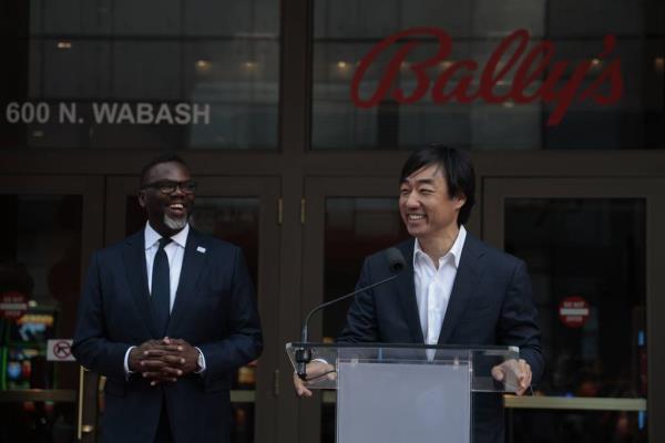 Mayor Brandon Johnson listens as Soo Kim, chairman of the board of directors at Bally’s Corporation speaks during Bally’s Chicago Casino’s ribbon-cutting ceremony, Oct. 3, 2023. 