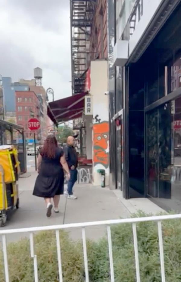 Prince Harry walking down the sidewalk to East Side Ink tattoo parlor in Manhattan, NYC