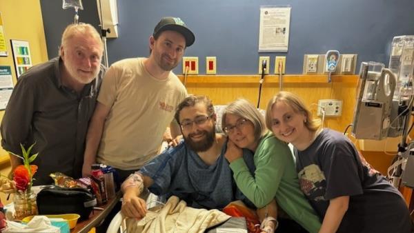 O'Neill with his family after he was flown to St. Anthony Hospital in Lakewood.