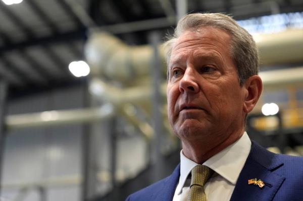 Georgia Governor Brian Kemp speaks with the media before the ribbon cutting ceremony for Aurubis Richmond in Augusta, Ga., on Friday, Sept. 20, 2024.