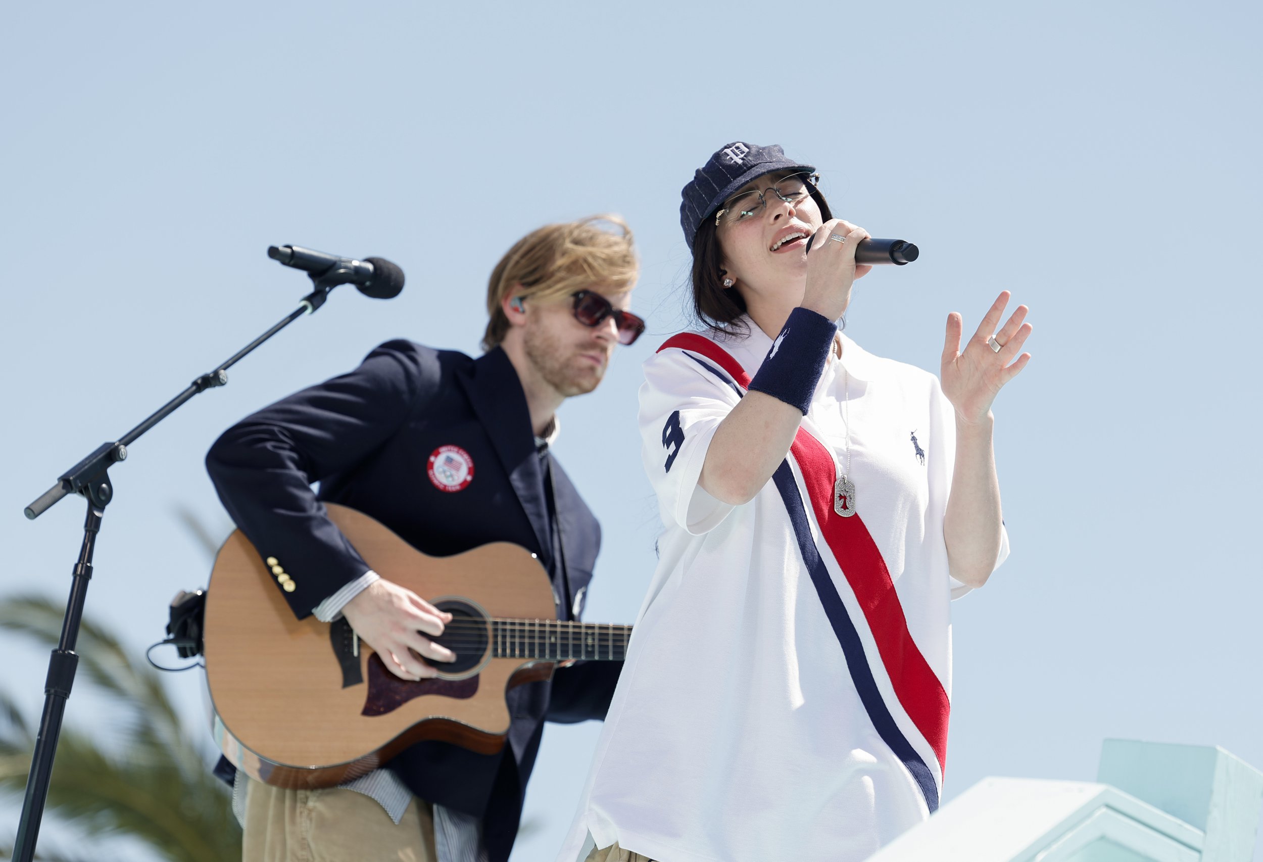 Billie Eilish and FINNEAS performing on Venice Beach for the Olympics closing ceremony