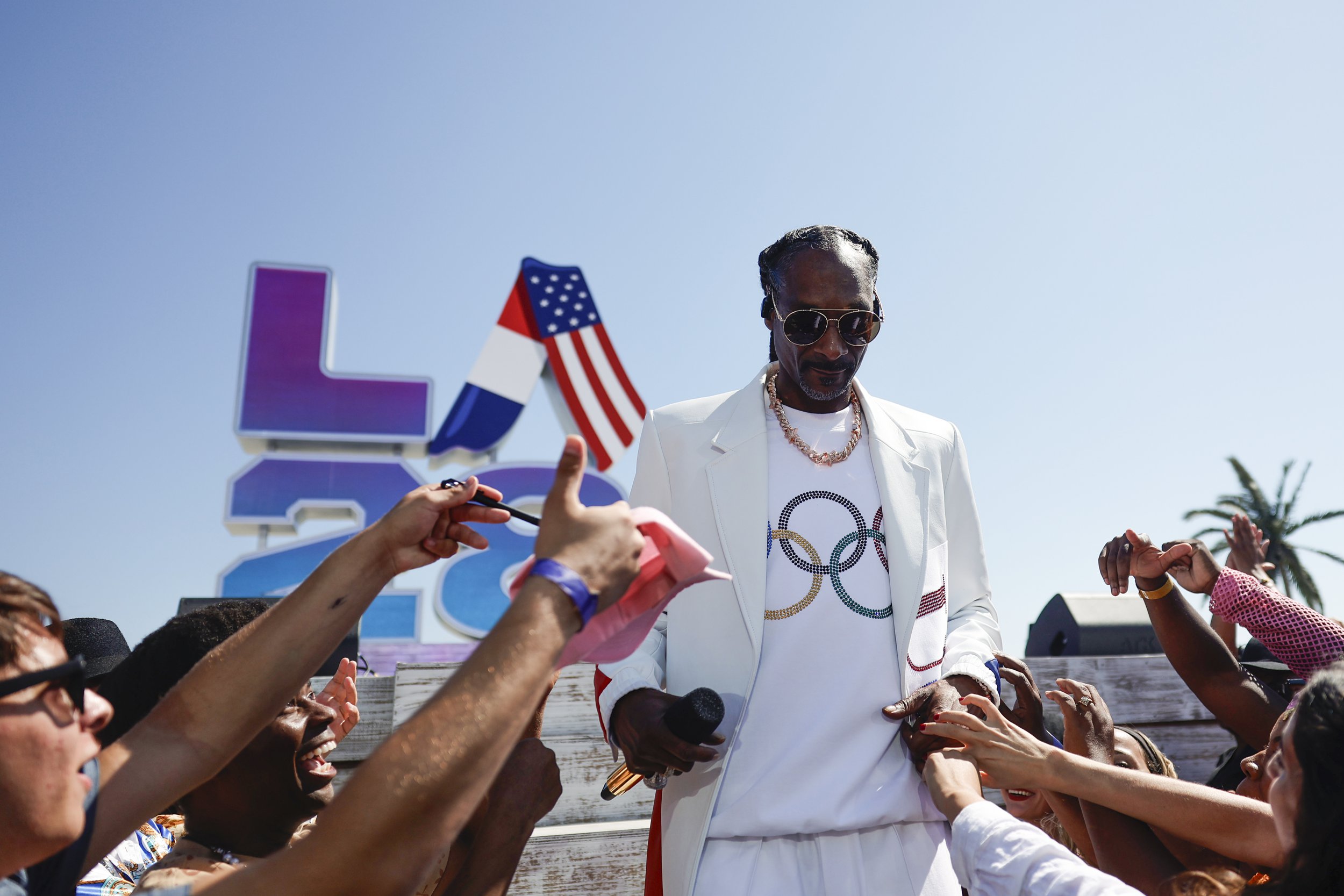 Snoop Dogg performing on Venice Beach for the Olympics closing ceremony