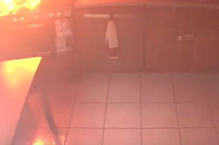 CCTV footage showed the home shrouded in smoke as a fire burned on the stove