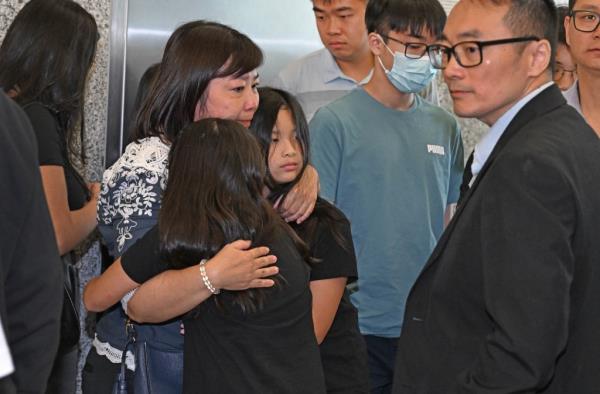 Liang's father, Ying Cai Liang (far right) and his family at Brooklyn Supreme Court for the sentencing.