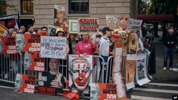 People protest against Prime Minister of Israel Benjamin Netanyahu during the 79th session of the United Nations General Assembly, in New York, Sept. 27, 2024.