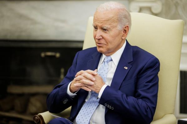 United States President Joe Biden meets with US Air Force General Charles Q. Brown, Jr, Chair, Joint Chiefs of Staff, in the Oval Office of the White House in Washington, DC on October 5, 2023. The President is receiving a briefing on Ukraine from the Chair and other members of his national security team. Credit: Samuel Corum / Pool via CNP (Credit Image: © Samuel Corum - Pool Via Cnp/dpa via ZUMA Press)