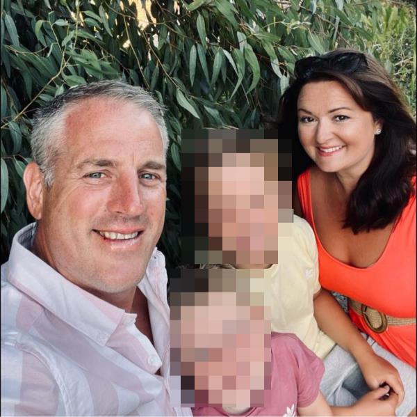 Natalie and Elliot Buss are pictured with their sons.
