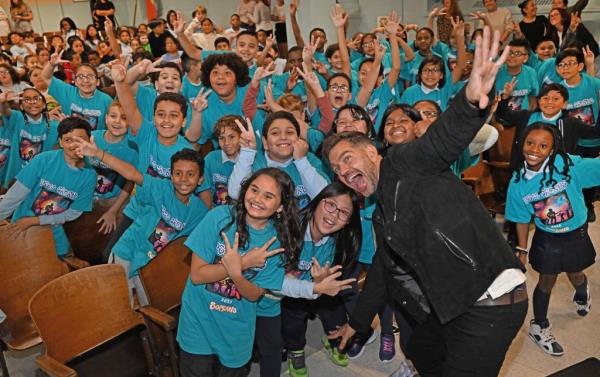 Musical pop star Andy Grammer (pictured) came to PS 22 to sing one of his new songs called "Magic" with the choir today.