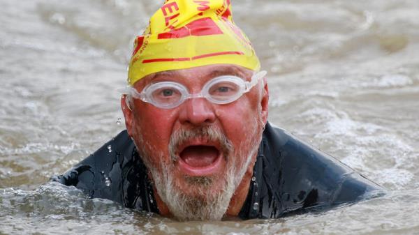 Suicide survivor becomes fastest and oldest person to swim River Shannon