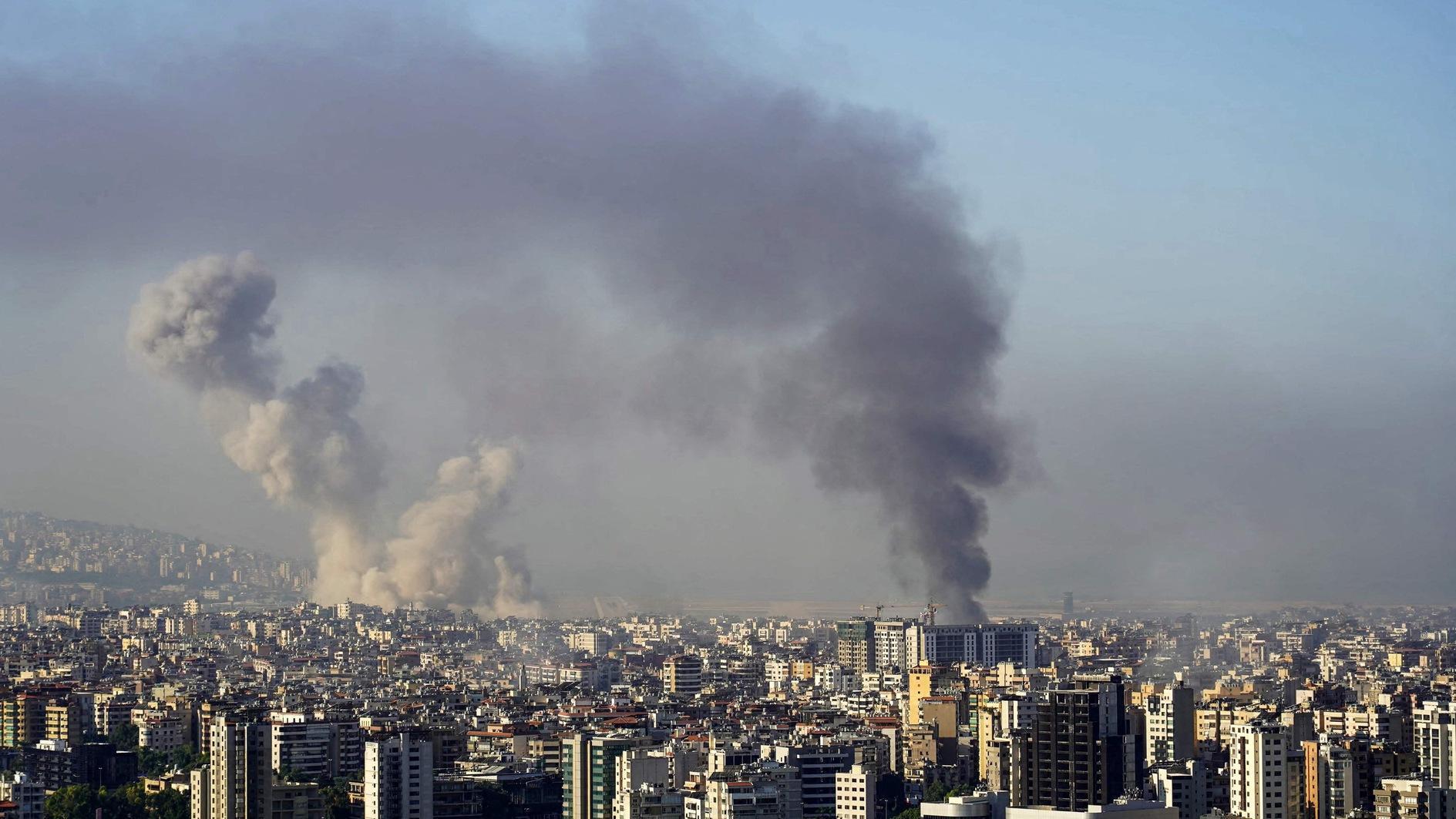 Israeli strikes rock Beirut, Iran says its allies will not back down