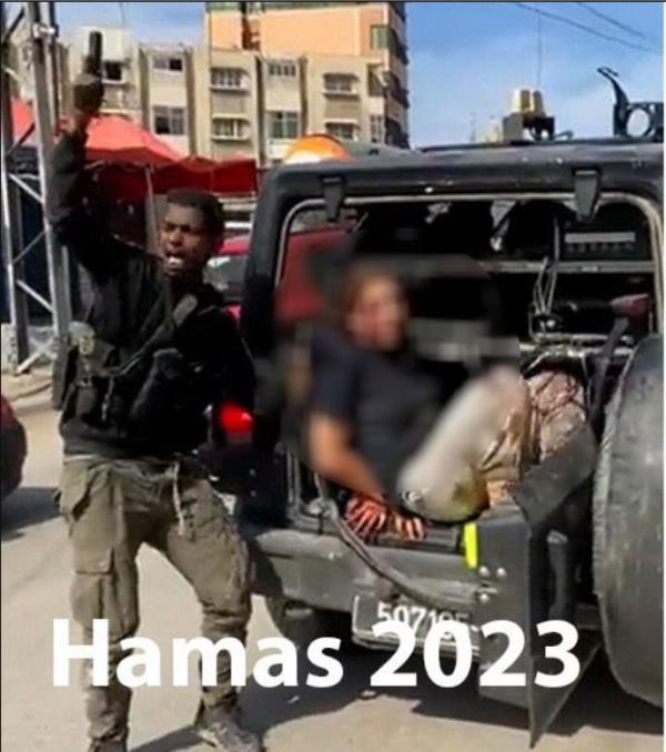 Hamas shared a photo of a militant kidnapping a bloodied victim near ...(917 chars omitted)...有停止祈祷,”塔米尔谈到那次可怕的经历时说。“我们能毫发无损地离开那里真是个奇迹。”</p>
<p style=