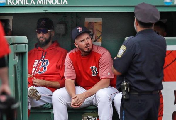 Boston Red Sox pitcher David Price, left, sits with relief pitcher Austin Maddox in the bullpen during the sixth inning of a baseball game against the Oakland Athletics at Fenway Park in Boston, Thursday, Sept. 14, 2017. Price was activated from the disabled list prior to the game and expected to work as a relief pitcher. (AP Photo/Charles Krupa)