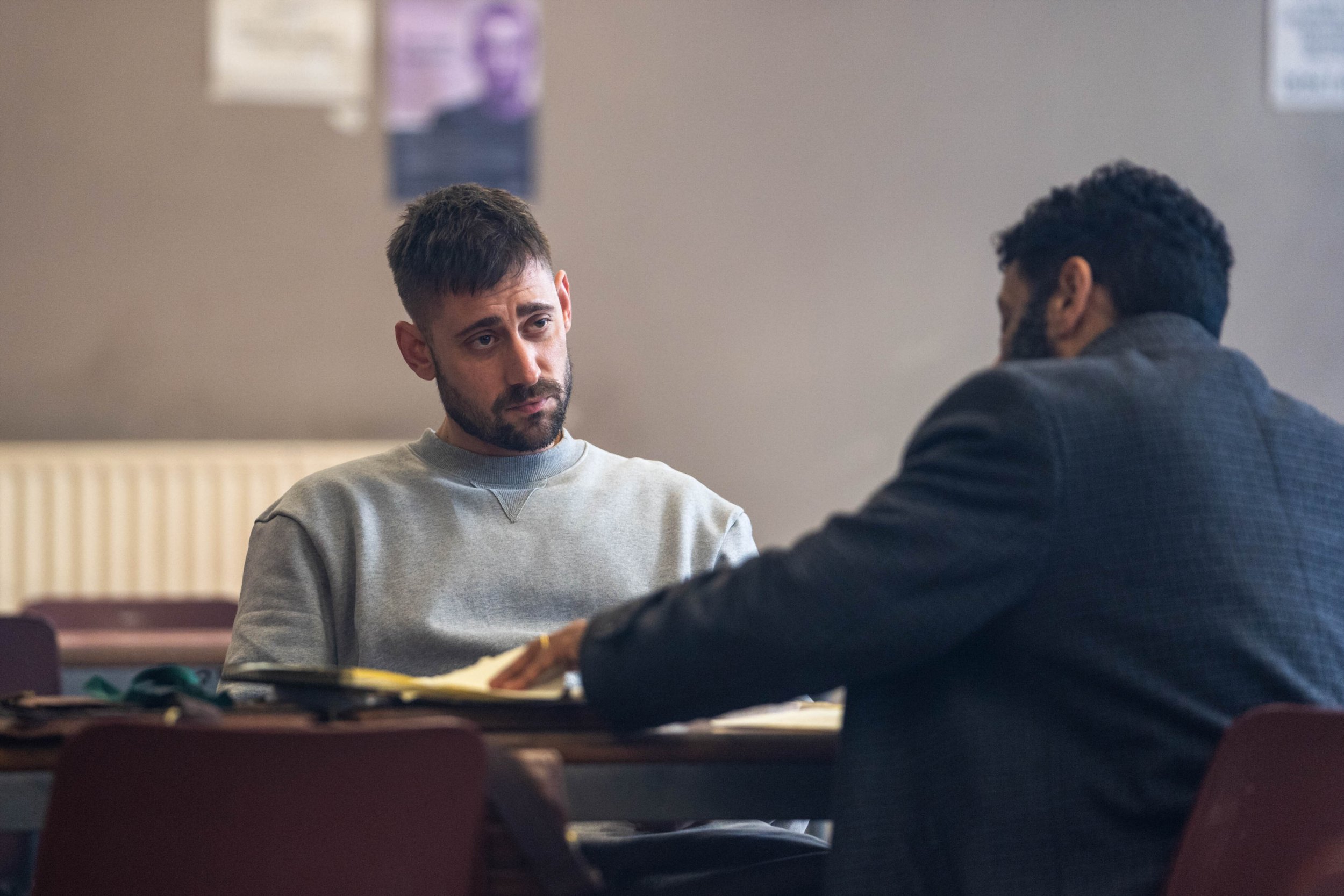 Adeel Akhtar as Sam Malik and Michael Socha as Justin Mitchell in Showtrial
