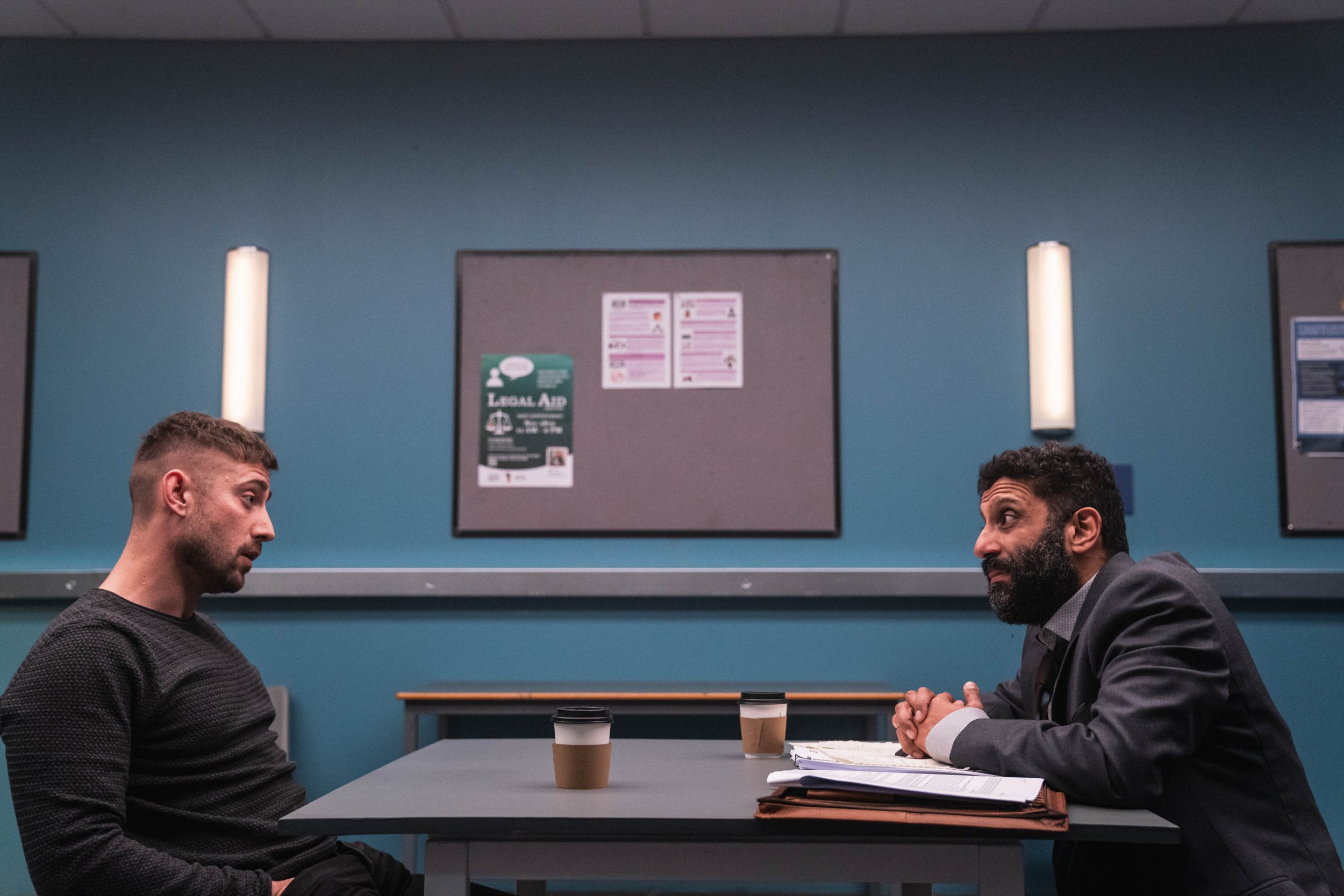 Adeel Akhtar as Sam Malik and Michael Socha as Justin Mitchell in Showtrial