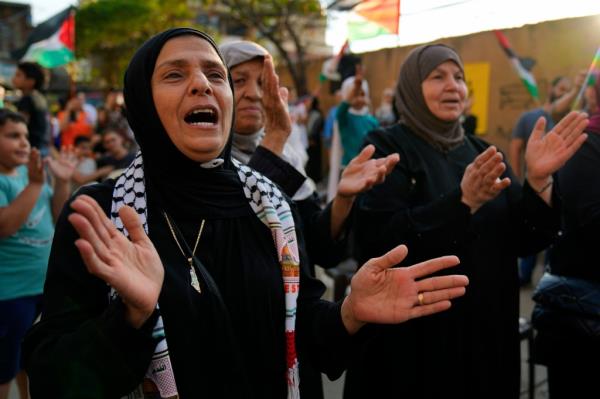 Palestinian demonstrators in Gaza on Wednesday. Hamas' former leader called on neighboring Muslim countries to attack Israel