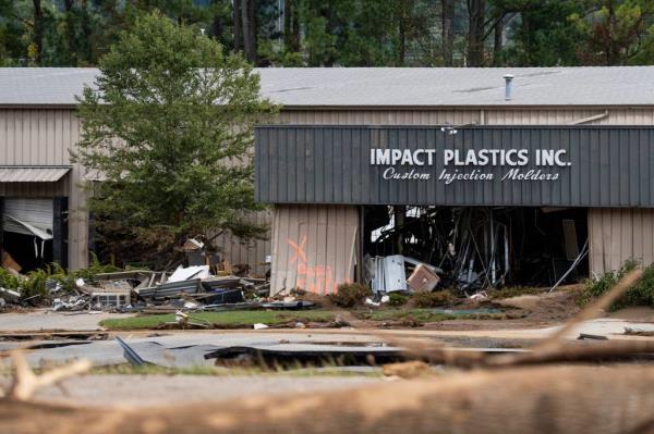 Impact Plastics Inc. surrounded by mud and debris in Erwin, Tenn., on Tuesday, Oct. 1, 2024.