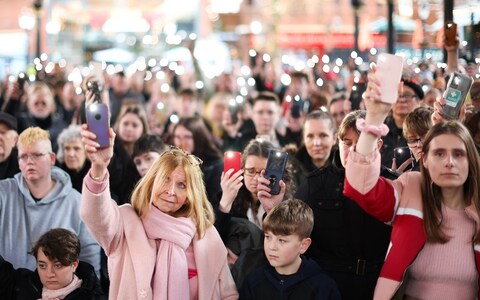 People gathered at Golden Square Shopping Centre in Warrington on Sunday to mark a year since the murder