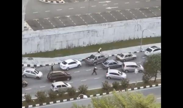 In Kepong, nine shots fired as driver tries to run down police officers (VIDEO)