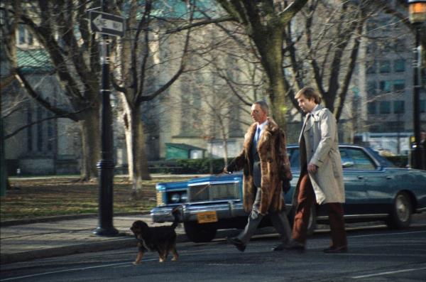 Jeremy Strong and Sebastian Stan walking a dog