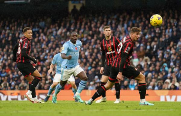 Manchester City's Jeremy Doku scores their side's first goal of the game. Manchester City's Jeremy Doku scores their side's first goal of the game.