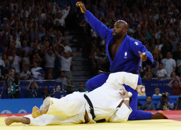 Teddy Riner of France reacts after winning Minjong Kim of South Korea on August 2, 2024 in Paris.