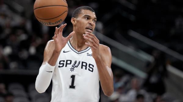 Wembanyama kept the highlights coming in his third NBA preseason game with the Spurs. (AP Photo/Eric Gay)