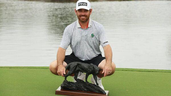 Louis Oosthuizen holds on to claim win at delayed Alfred Dunhill Championship